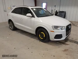 2016 Audi Q3 Premium Plus with VIN WA1EFCFS2GR015940, listed as a IAAI auction lot 41243107 with 91,538 mi miles. Bid and sale history available at carsss.com. Image 1.