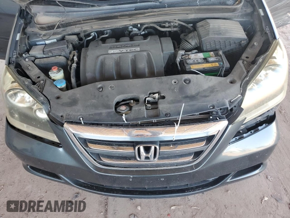 2006 Honda Odyssey EX with VIN 5FNRL384X6B461661, listed as a Copart auction lot 61051915 with 190,578 mi miles and Salvage title. Bid and sale history available at DreamBid. Image 12.