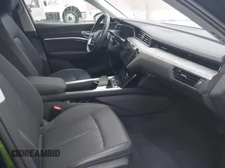 2022 Audi e-tron Premium Plus with VIN WA1LAAGE5NB022695, listed as a IAAI auction lot 41181338 with 14,711 mi miles and . Bid and sale history available at DreamBid. Image 5.