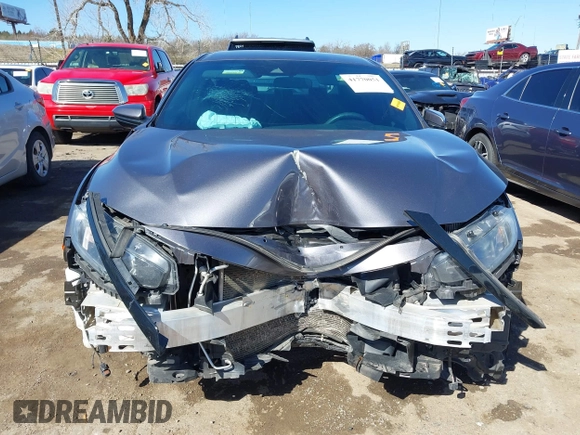 2019 Honda Civic Sport with VIN 19XFC2F82KE019704, listed as a IAAI auction lot 41770051 with 90,011 mi miles and . Bid and sale history available at DreamBid. Image 12.