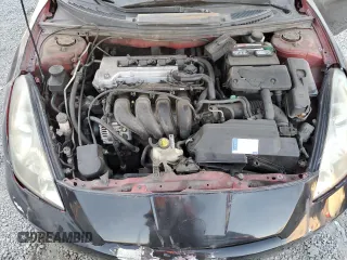2004 Toyota Celica GT with VIN JTDDR32T040168744, listed as a Copart auction lot 85504754 with 210,919 mi miles and Clean Title. Bid and sale history available at DreamBid. Image 11.