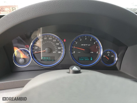 2007 Jeep Grand Cherokee SRT-8 with VIN 1J8HR78367C658164, listed as a Copart auction lot 82672764 with 75,272 mi miles and Salvage Title. Bid and sale history available at carsss.com. Image 9.