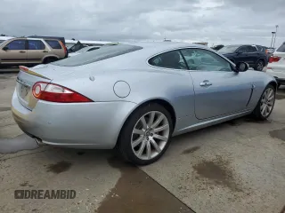 2007 Jaguar XK with VIN SAJWA43B475B12815, listed as a Copart auction lot 75012064 with 55,917 mi miles and Salvage Title. Bid and sale history available at carsss.com. Image 3.