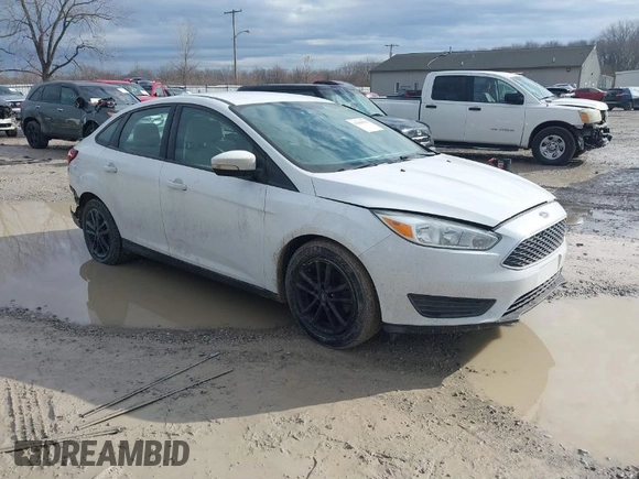 2016 Ford Focus SE z VIN 1FADP3F23GL343651, wystawiony jako IAAI lot #41668112 z przebiegiem 120 891 mil mil oraz . Historia ofert i sprzedaży dostępna na DreamBid. Obrazek 1.