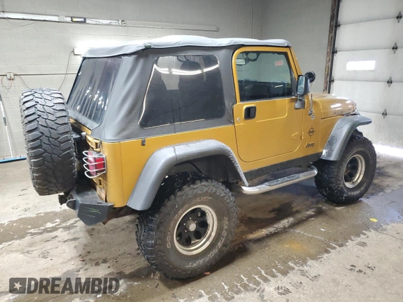 2003 Jeep Wrangler Rubicon with VIN 1J4FA69S23P322353, listed as a Copart auction lot 43915745 with 117,769 mi miles and Salvage title. Bid and sale history available at DreamBid. Image 3.