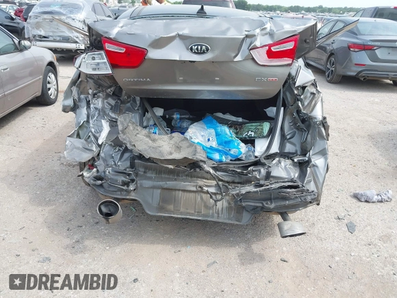 2015 Kia Optima EX with VIN 5XXGN4A70FG442402, listed as a IAAI auction lot 42260968 with 94,512 mi miles and . Bid and sale history available at DreamBid. Image 6.