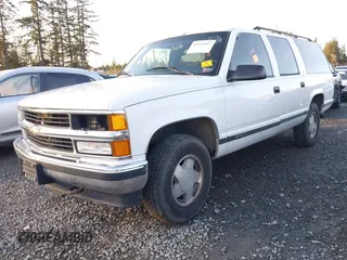 1997 Chevrolet Suburban with VIN 3GNFK16RXVG102805, listed as a IAAI auction lot 41559415 with 1 mi miles. Bid and sale history available at carsss.com. Image 2.