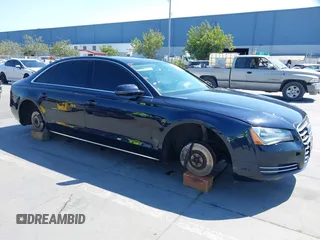 2012 Audi A8 с VIN WAURVAFD4CN016182, выставлен на аукционе IAAI как лот 42711891 с пробегом 154 165 миль миль и . История ставок и продаж доступна на DreamBid. Изображение 1.