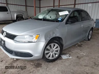 2014 Volkswagen Jetta Sedan S with VIN 3VW2K7AJ3EM310020, listed as a IAAI auction lot 41338164 with 76,456 mi miles. Bid and sale history available at carsss.com. Image 17.