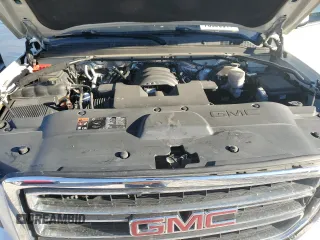 2015 GMC Yukon XL SLT with VIN 1GKS1HKC6FR166415, listed as a Copart auction lot 73029014 with 105,209 mi miles and Salvage Title. Bid and sale history available at carsss.com. Image 12.