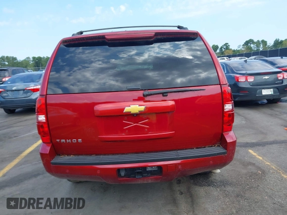 2013 Chevrolet Tahoe LS with VIN 1GNSCAE00DR359498, listed as a IAAI auction lot 40125477 with 156,100 mi miles and . Bid and sale history available at DreamBid. Image 15.