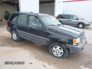 1994 Jeep Grand Cherokee Laredo with VIN 1J4GZ58S2RC118838, listed as a IAAI auction lot 42047224 with 160,715 mi miles. Bid and sale history available at carsss.com. Image 1.