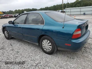 1995 Honda Accord LX with VIN 1HGCD5635SA071449, listed as a Copart auction lot 71596954 with 305,695 mi miles and Salvage Title. Bid and sale history available at carsss.com. Image 2.