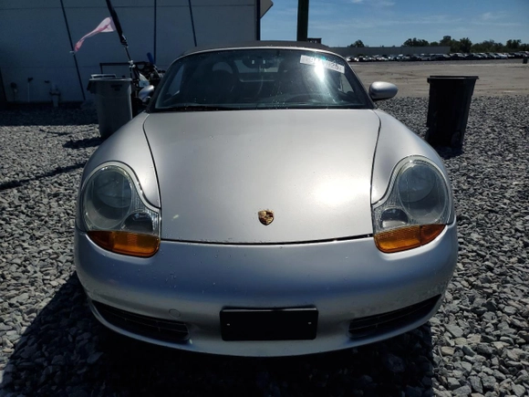 1998 Porsche Boxster z VIN WP0CA298XWU622217, wystawiony jako Copart lot #49441925 z przebiegiem 120 638 mil mil oraz Szkoda całkowita • Salvage title. Historia ofert i sprzedaży dostępna na DreamBid. Obrazek 5.