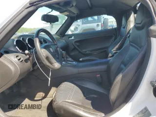 2008 Pontiac Solstice z VIN 1G2MC35B58Y123587, wystawiony jako Copart lot #52017005 z przebiegiem Nie podano mil oraz Szkoda całkowita • Salvage title. Historia ofert i sprzedaży dostępna na DreamBid. Obrazek 7.