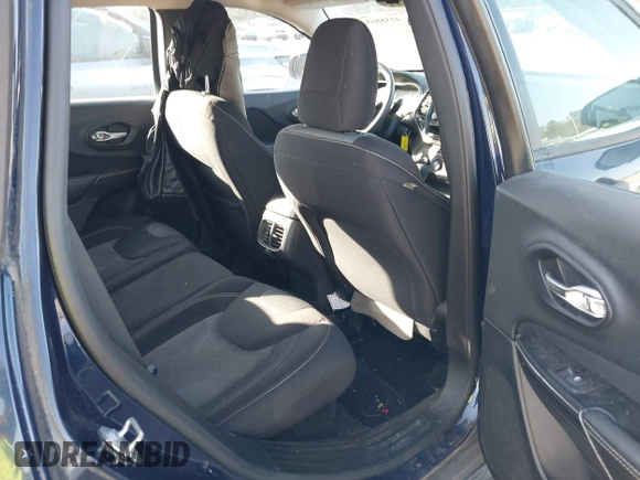 2015 Jeep Cherokee Sport with VIN 1C4PJLAB2FW547371, listed as a IAAI auction lot 41588682 with 135,640 mi miles. Bid and sale history available at carsss.com. Image 8.