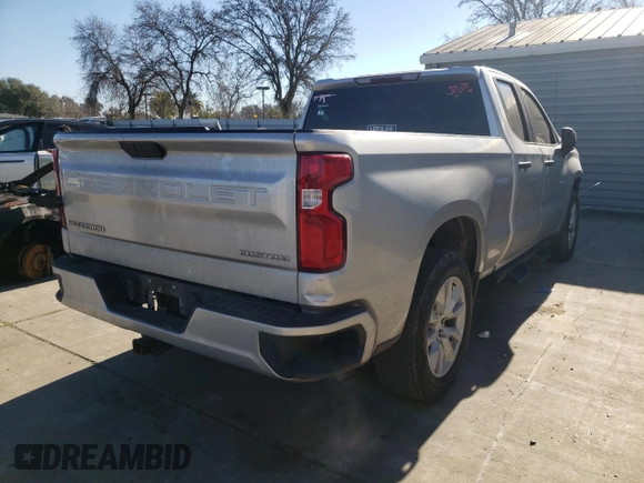 2021 Chevrolet Silverado 1500 Custom with VIN 1GCRWBEK0MZ188967, listed as a Copart auction lot 87637995 with 104,744 mi miles and Salvage Title. Bid and sale history available at DreamBid. Image 3.