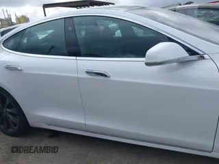 2018 Tesla Model S 75D with VIN 5YJSA1E23JF271465, listed as a IAAI auction lot 41911356 with 50,483 mi miles and . Bid and sale history available at DreamBid. Image 13.