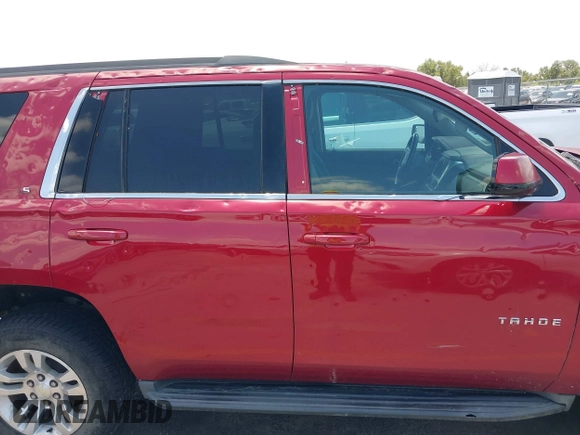 2015 Chevrolet Tahoe LS with VIN 1GNSCAEC4FR121571, listed as a IAAI auction lot 42499156 with 131,284 mi miles and . Bid and sale history available at DreamBid. Image 13.