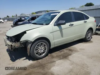 2010 Ford Focus SE with VIN 1FAHP3FN1AW227852, listed as a Copart auction lot 56392435 with 145,047 mi miles and Salvage Title. Bid and sale history available at DreamBid. Image 1.