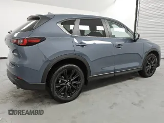 2024 Mazda CX-5 2.5 S Carbon Edition with VIN JM3KFBCL3R0488440, listed as a Copart auction lot 54944065 with 28,991 mi miles and Clean Title. Bid and sale history available at carsss.com. Image 3.