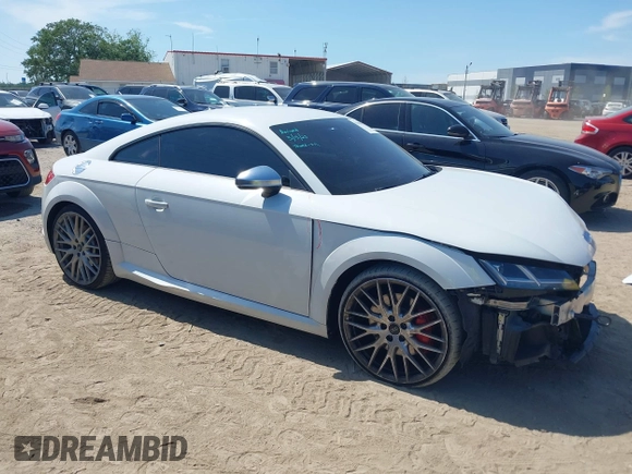 2016 Audi TTS 2.0T z VIN TRUC1AFV5G1030771, wystawiony jako IAAI lot #41940807 z przebiegiem 81 357 mil mil oraz . Historia ofert i sprzedaży dostępna na DreamBid. Obrazek 1.