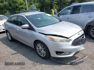 2015 Ford Focus SE z VIN 1FADP3F27FL376330, wystawiony jako IAAI lot #42694444 z przebiegiem 91 103 mil mil oraz . Historia ofert i sprzedaży dostępna na DreamBid. Obrazek 1.