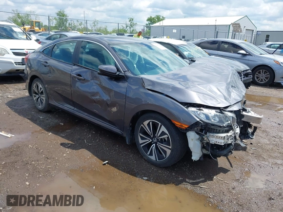 2018 Honda Civic EX-T z VIN 2HGFC1F34JH643975, wystawiony jako IAAI lot #42209799 z przebiegiem 58 684 mil mil oraz . Historia ofert i sprzedaży dostępna na DreamBid. Obrazek 1.