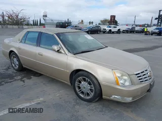 2006 Cadillac DTS w/1SC with VIN 1G6KD57Y26U112518, listed as a IAAI auction lot 42100747 with 122,149 mi miles. Bid and sale history available at carsss.com. Image 1.