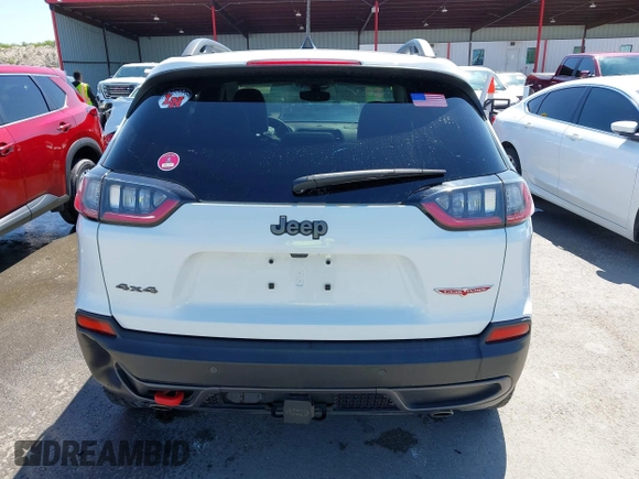 2021 Jeep Cherokee Trailhawk with VIN 1C4PJMBX1MD145169, listed as a IAAI auction lot 42340464 with 50,925 mi miles and . Bid and sale history available at DreamBid. Image 16.