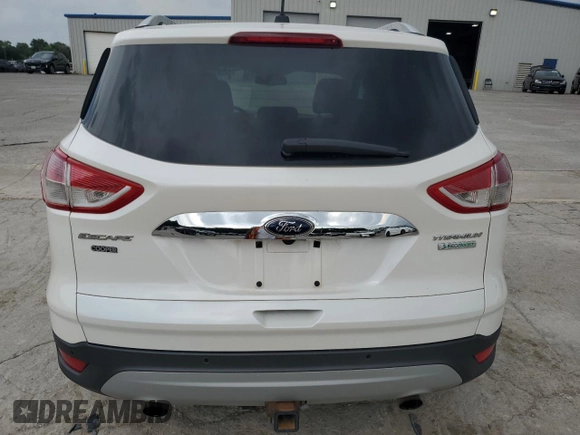 2014 Ford Escape Titanium с VIN 1FMCU0J97EUB15513, выставлен на аукционе Copart как лот 57391715 с пробегом 125 851 миль миль и Списание • Salvage title. История ставок и продаж доступна на DreamBid. Изображение 6.