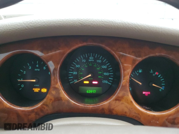 1999 Jaguar XJ with VIN SAJKD6041XC876928, listed as a Copart auction lot 60038405 with 63,917 mi miles and Clean title. Bid and sale history available at DreamBid. Image 9.
