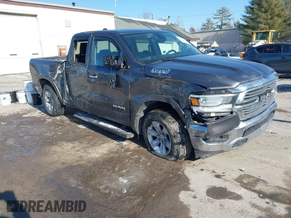 2019 Ram 1500 Laramie with VIN 1C6SRFDTXKN860913, listed as a IAAI auction lot 41356687 with 199,485 mi miles. Bid and sale history available at carsss.com. Image 1.