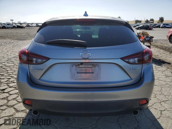 2015 Mazda 3 i Grand Touring z VIN JM1BM1M70F1260802, wystawiony jako Copart lot #60662705 z przebiegiem 89 974 mil mil oraz Szkoda całkowita • Salvage title. Historia ofert i sprzedaży dostępna na DreamBid. Obrazek 6.