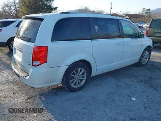 2019 Dodge Grand Caravan SXT with VIN 2C4RDGCG2KR775177, listed as a IAAI auction lot 41363146 with 129,739 mi miles and . Bid and sale history available at DreamBid. Image 4.