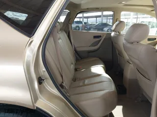 2004 Nissan Murano SL with VIN JN8AZ08T34W212858, listed as a IAAI auction lot 41779057 with 152,506 mi miles. Bid and sale history available at carsss.com. Image 8.
