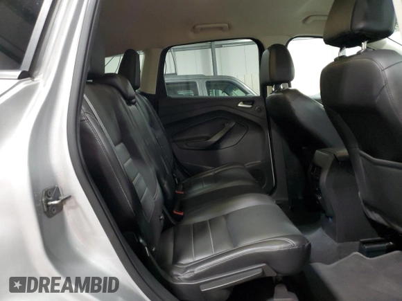 2016 Ford Escape Titanium with VIN 1FMCU9J95GUC27654, listed as a Copart auction lot 51950575 with 101,220 mi miles and Salvage Title. Bid and sale history available at carsss.com. Image 11.