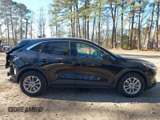 2020 Ford Escape SE z VIN 1FMCU0G6XLUA07056, wystawiony jako IAAI lot #41156940 z przebiegiem 103 707 mil mil oraz . Historia ofert i sprzedaży dostępna na DreamBid. Obrazek 13.