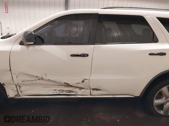 2012 Dodge Durango Citadel with VIN 1C4RDJEG9CC252663, listed as a IAAI auction lot 41260875 with 126,128 mi miles and . Bid and sale history available at DreamBid. Image 15.