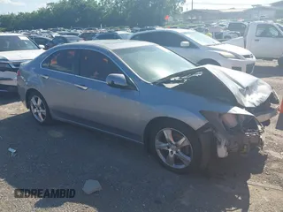 2012 Acura TSX Technology z VIN JH4CU2F61CC017108, wystawiony jako IAAI lot #42314321 z przebiegiem 310 880 mil mil oraz . Historia ofert i sprzedaży dostępna na DreamBid. Obrazek 1.