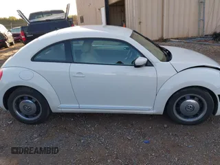 2013 Volkswagen Beetle Fender Edition с VIN 3VWJP7AT2DM614534, выставлен на аукционе IAAI как лот 41919625 с пробегом 86 362 миль миль и . История ставок и продаж доступна на DreamBid. Изображение 13.