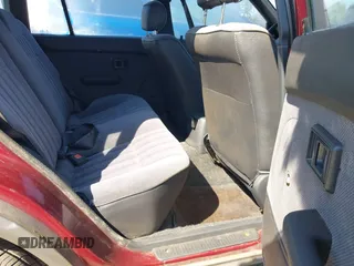 1991 Toyota Corolla z VIN JT2AE94V7M3017214, wystawiony jako IAAI lot #41959814 z przebiegiem 189 458 mil mil oraz . Historia ofert i sprzedaży dostępna na DreamBid. Obrazek 8.
