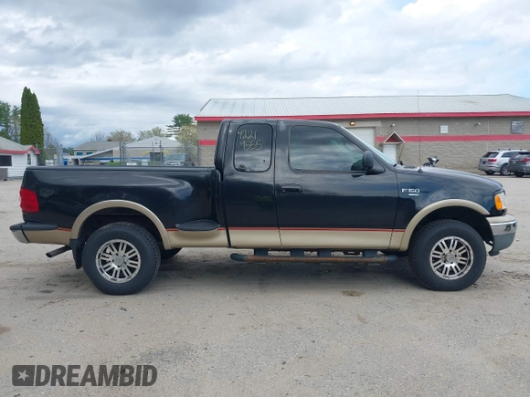 1999 Ford F-150 XL z VIN 2FTRX08L8XCA05595, wystawiony jako IAAI lot #42219555 z przebiegiem 213 636 mil mil oraz . Historia ofert i sprzedaży dostępna na DreamBid. Obrazek 14.