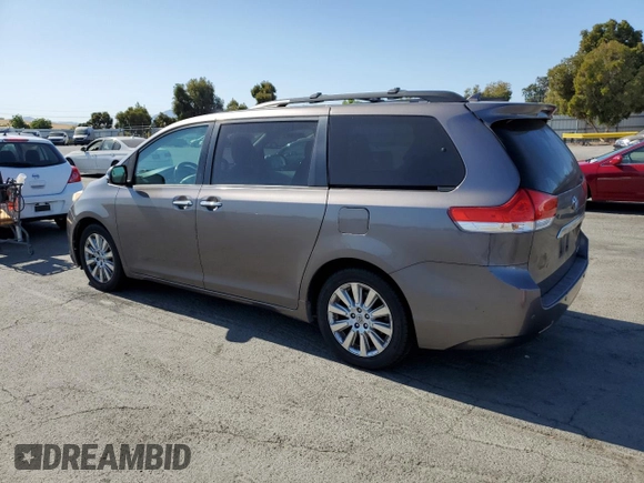 2014 Toyota Sienna Limited with VIN 5TDDK3DC0ES081720, listed as a Copart auction lot 63143875 with 213,928 mi miles and Clean title. Bid and sale history available at DreamBid. Image 2.