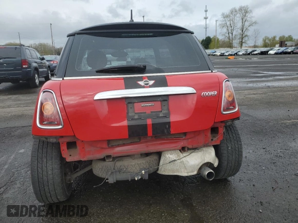 2009 MINI Hardtop with VIN WMWMF33509TU73771, listed as a Copart auction lot 51156025 with 119,622 mi miles and Salvage Title. Bid and sale history available at DreamBid. Image 6.