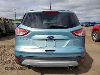 2013 Ford Escape SE with VIN 1FMCU0GXXDUD09330, listed as a Copart auction lot 57237275 with 116,609 mi miles and Clean title. Bid and sale history available at DreamBid. Image 6.