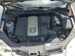 2009 Volkswagen Rabbit S z VIN WVWBA71K39W082458, wystawiony jako Copart lot #58893355 z przebiegiem 154 963 mil mil oraz Szkoda całkowita • Salvage title. Historia ofert i sprzedaży dostępna na DreamBid. Obrazek 11.