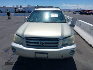 2003 Toyota Highlander z VIN JTEGD21A030060835, wystawiony jako IAAI lot #42203235 z przebiegiem 129 627 mil mil oraz . Historia ofert i sprzedaży dostępna na DreamBid. Obrazek 14.