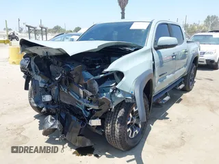 2022 Toyota Tacoma SR with VIN 3TYCZ5AN0NT104300, listed as a IAAI auction lot 42652503 with 18,071 mi miles and . Bid and sale history available at DreamBid. Image 18.