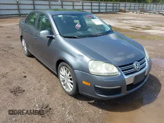 2008 Volkswagen Jetta Sedan Wolfsburg with VIN 3VWRJ71K58M185147, listed as a IAAI auction lot 42076387 with 193,621 mi miles. Bid and sale history available at carsss.com. Image 6.